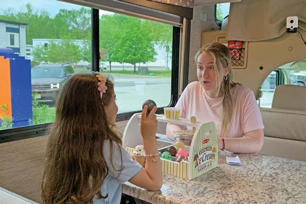 Speech-language therapy session inside the Logoped mobile RV featured by ASHA.
